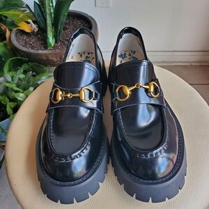 Gucci Black Sole with Gold Logo